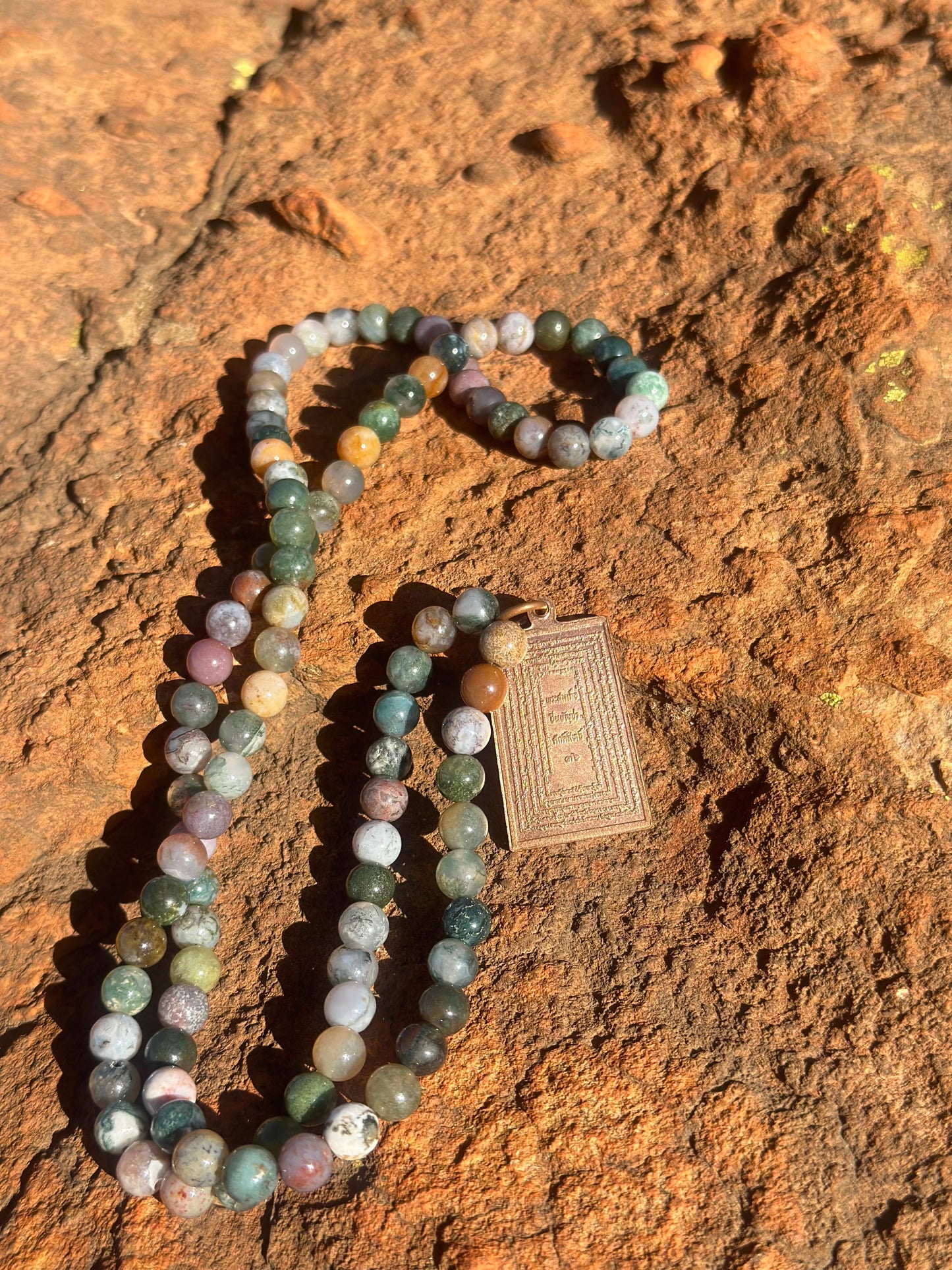 Copper Amulet on Crystal Necklace