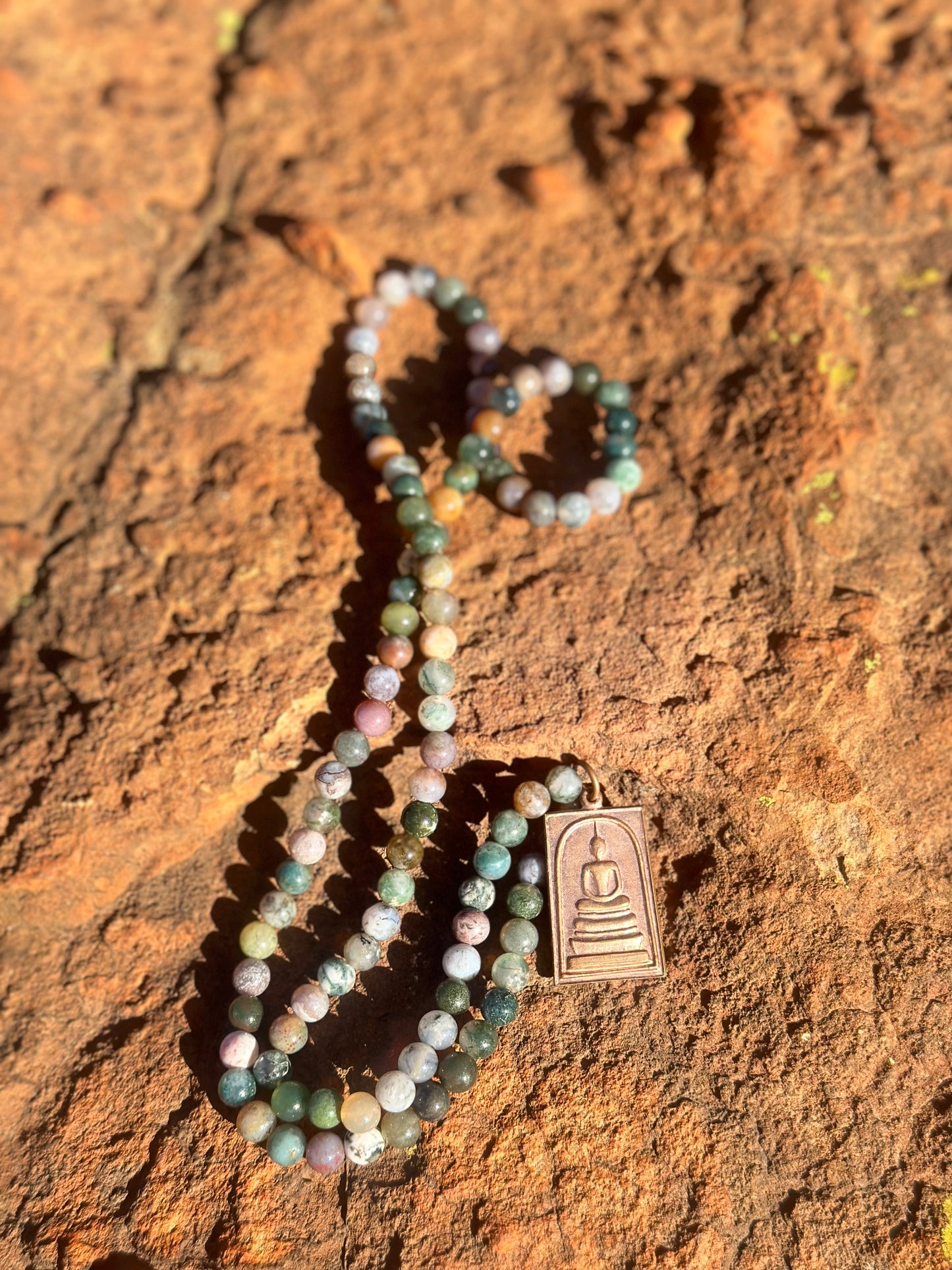 Copper Amulet on Crystal Necklace