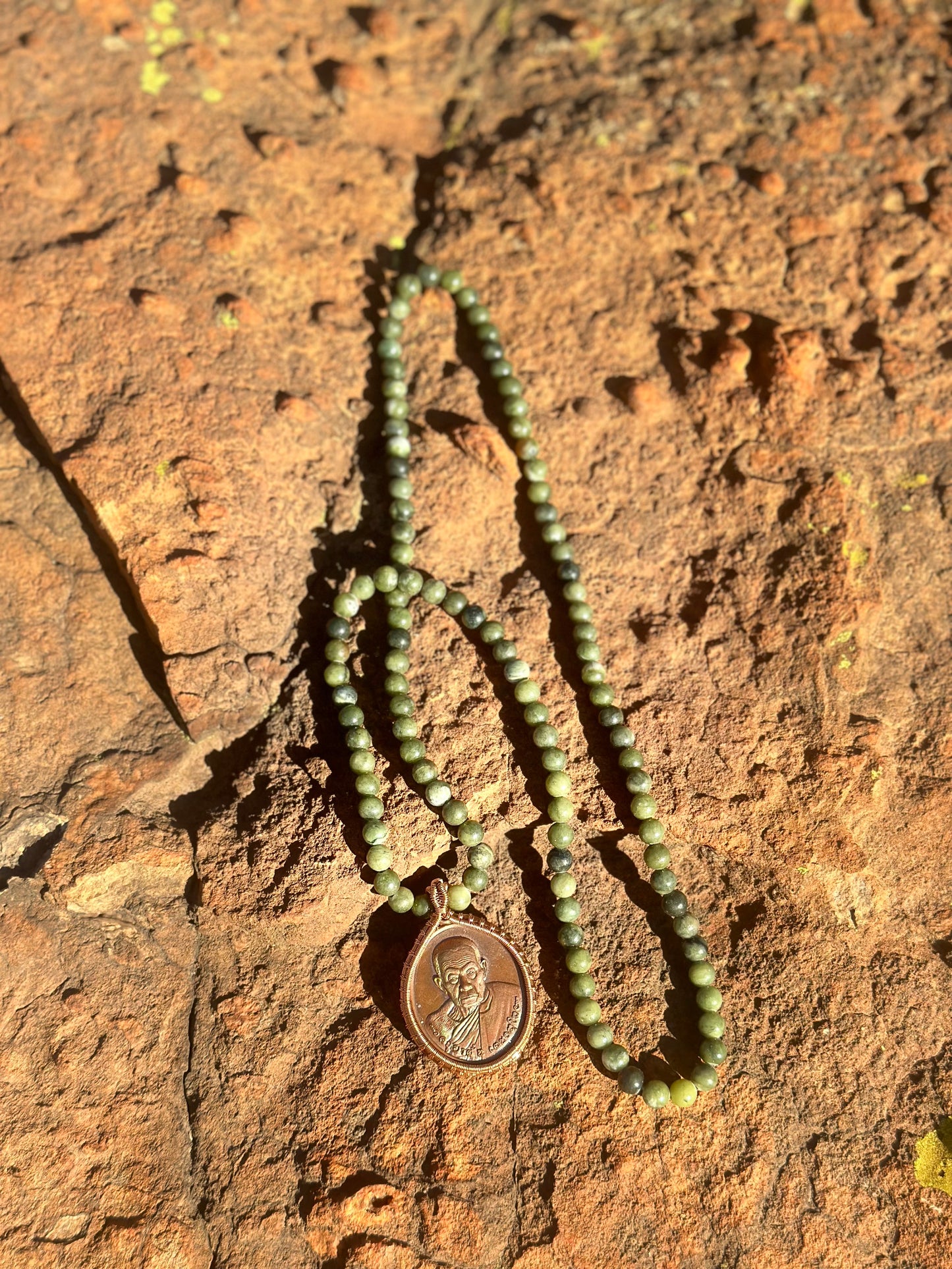 Amulet on Crystal Necklace